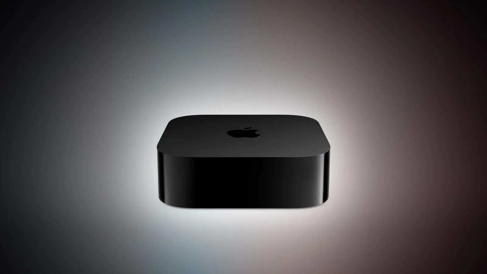 Apple TV 4K set-top box and Siri Remote beside a television