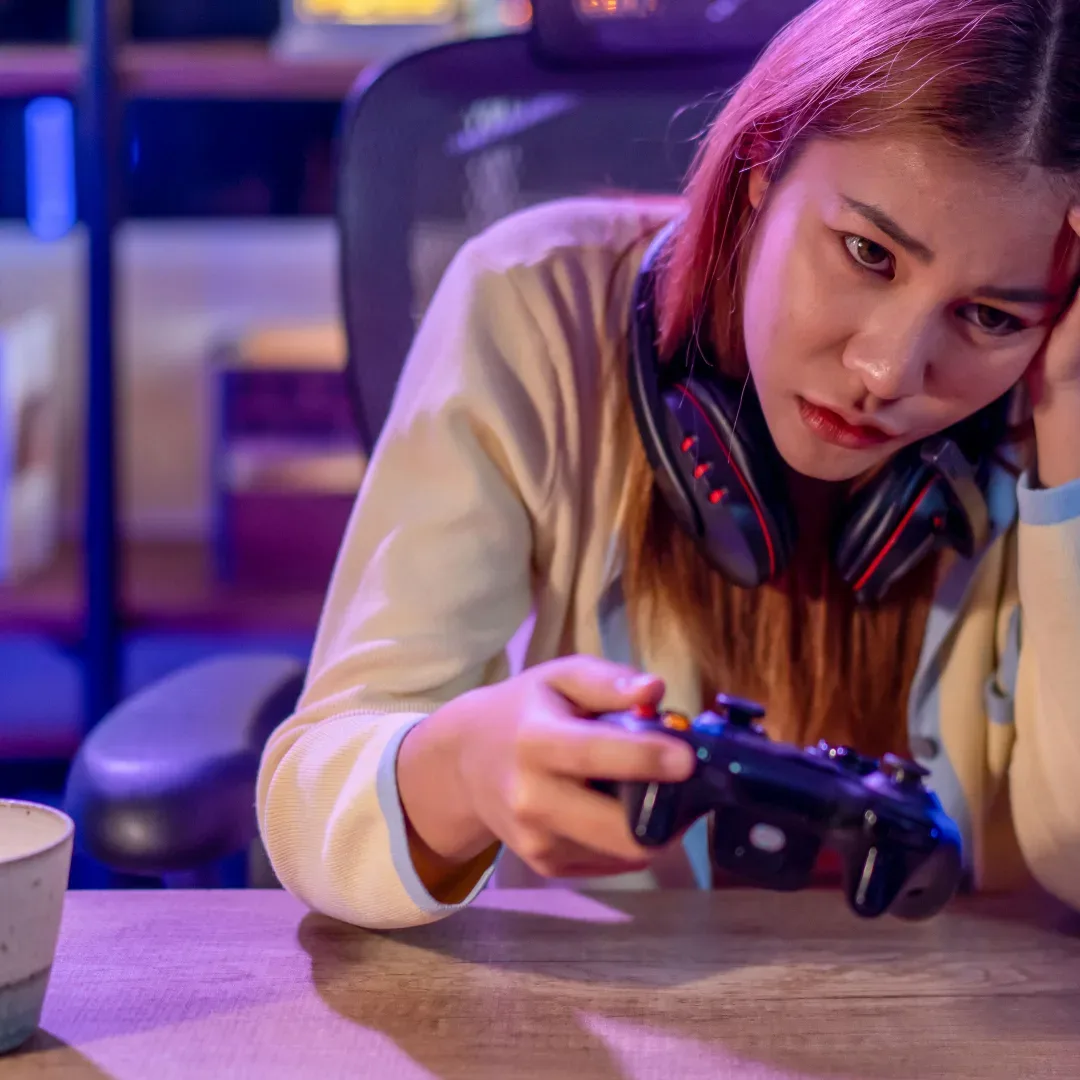Console controller and headset representing online gaming community conversations