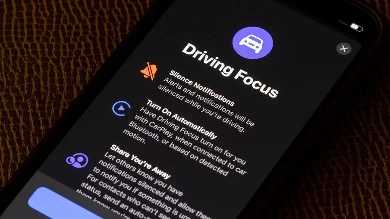 Car dashboard infotainment display using Apple CarPlay navigation
