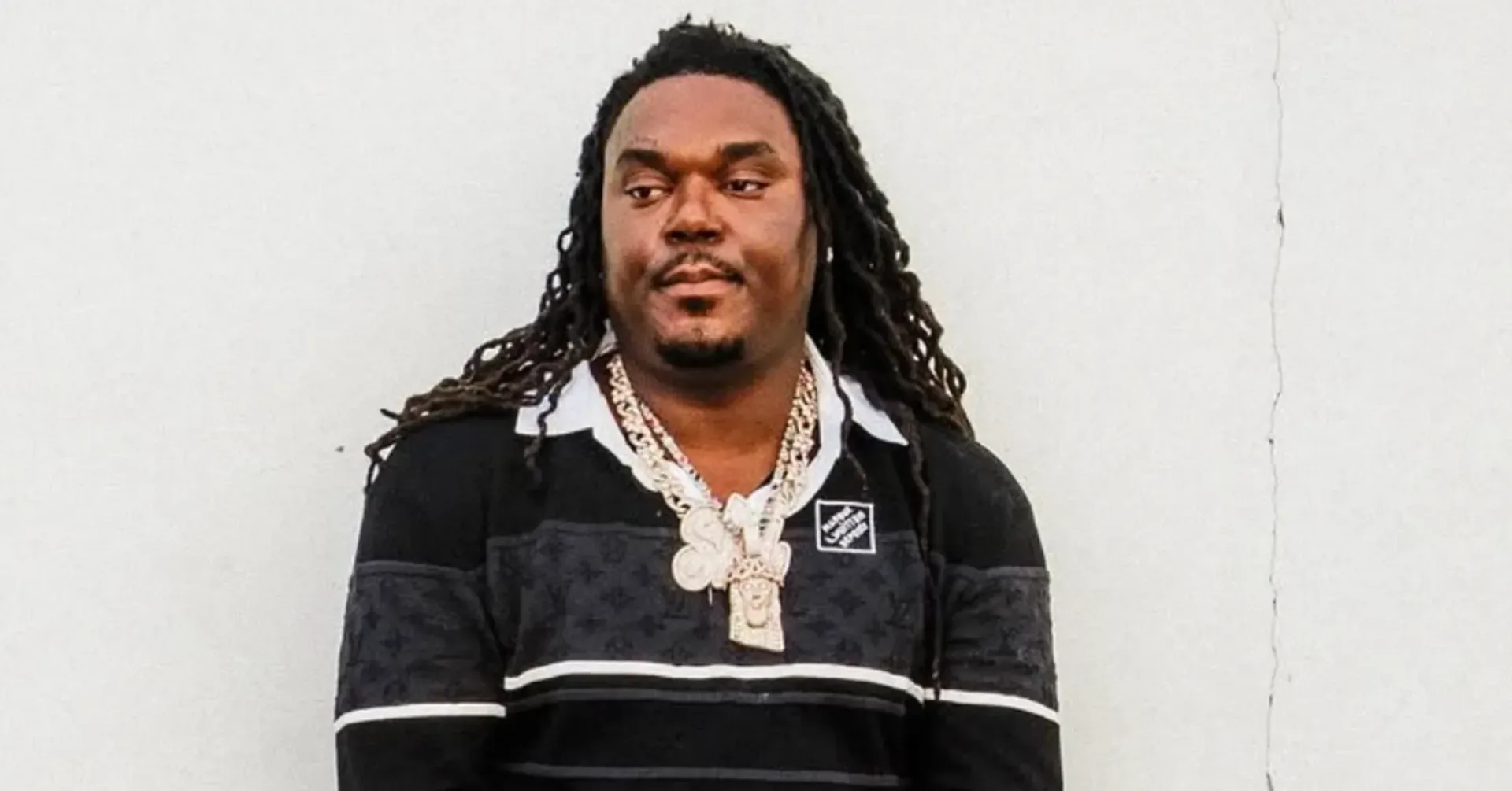 Lucki performs onstage during a live rap concert