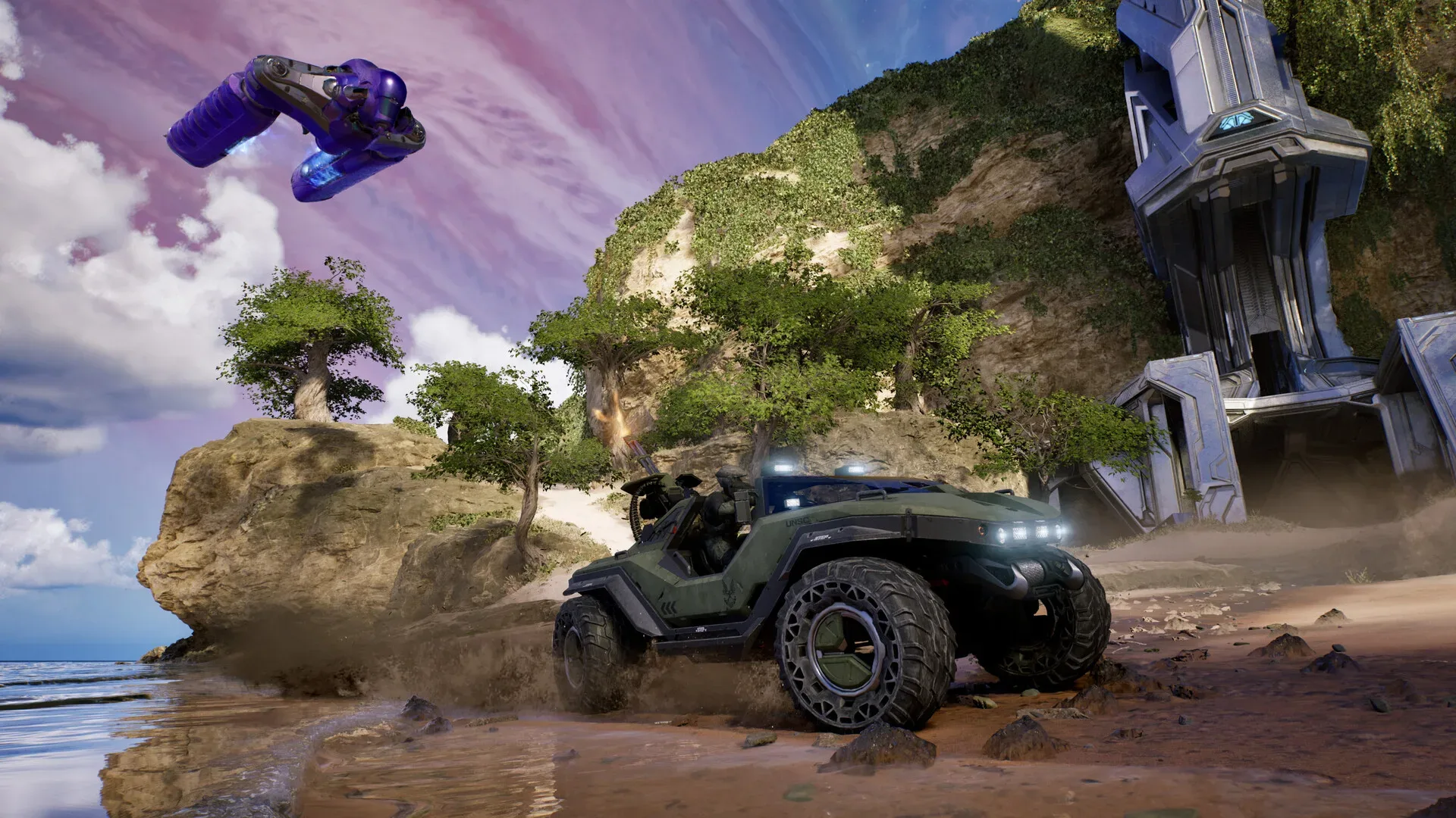 Two Halo co-op players face Flood enemies inside a futuristic facility