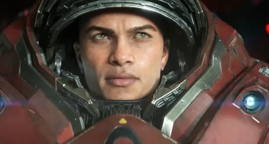 A Terran Marine in powered armor overlooking an alien StarCraft battlefield