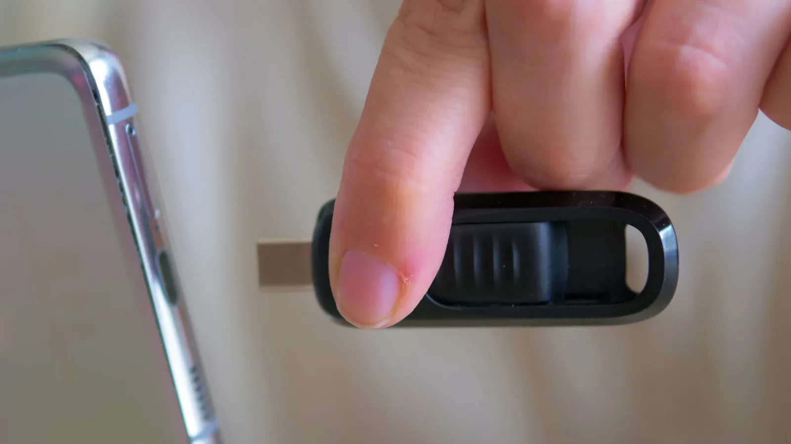 USB-C and USB-A flash drives shown beside a laptop