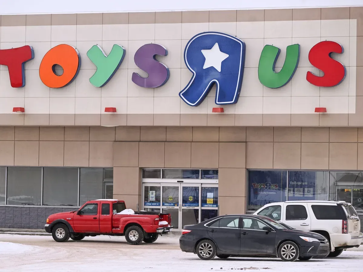 Toy store aisle with colorful character merchandise and games