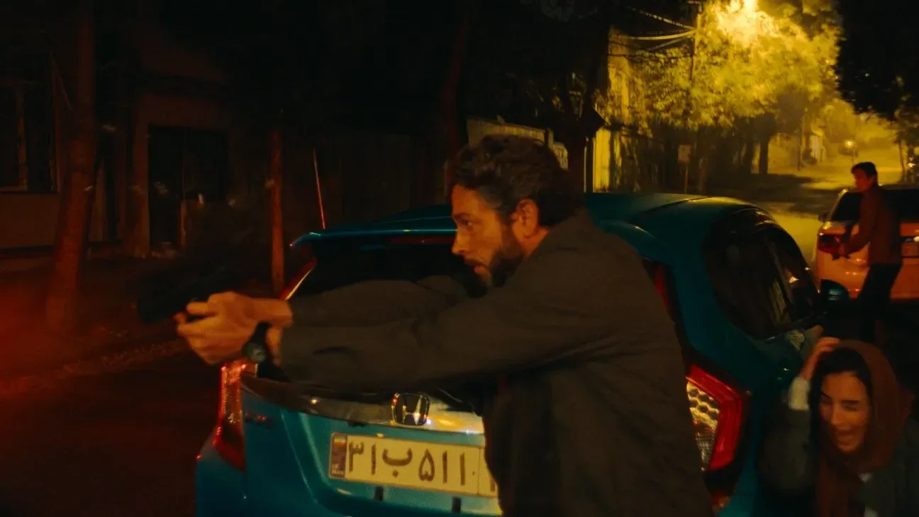 Zachary Levi as former CIA operative Tucker in The Fix