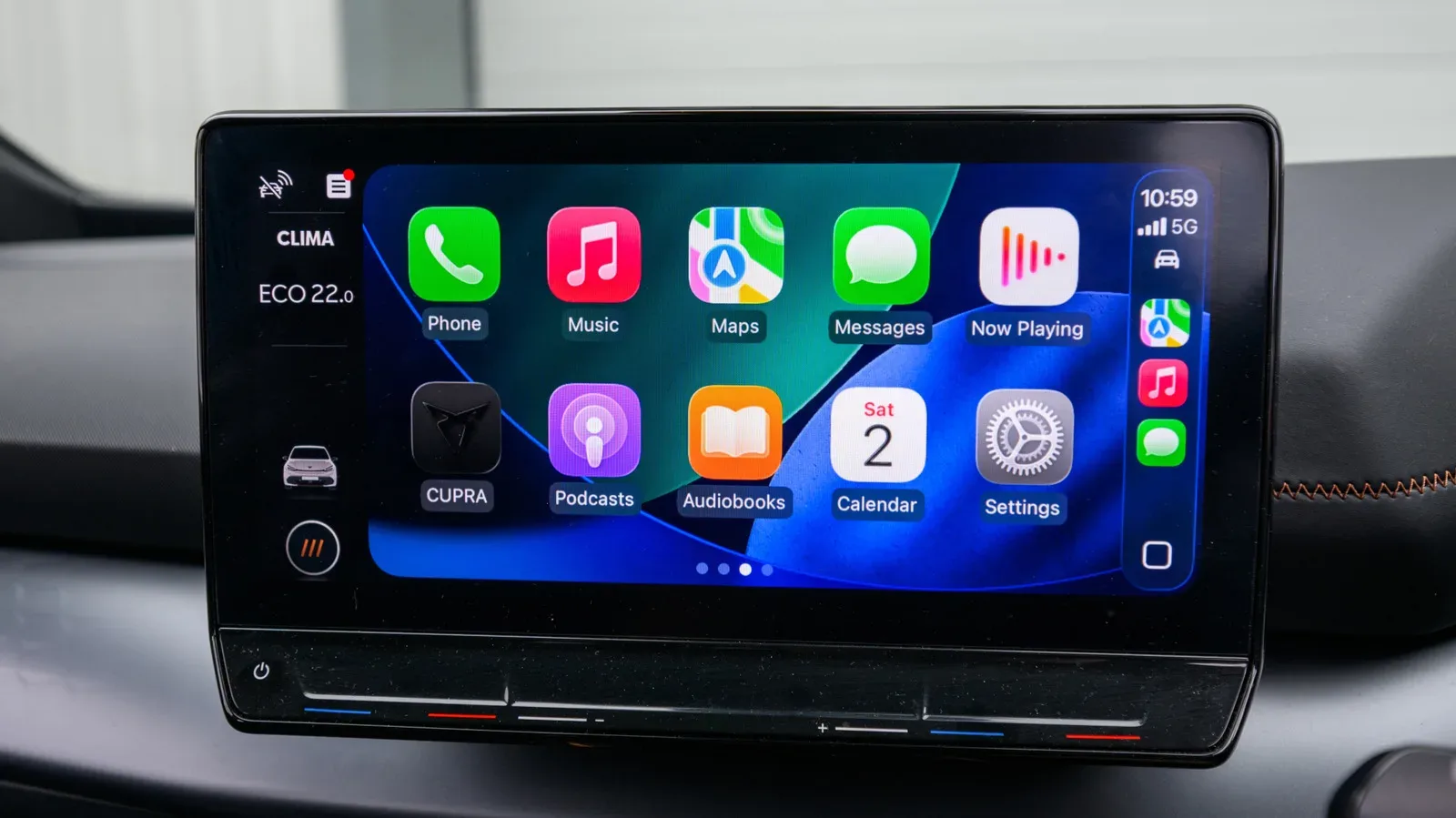 Portable Apple CarPlay display mounted on a vehicle dashboard showing navigation