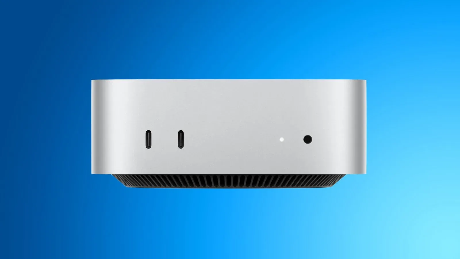 Apple Mac mini desktop computer beside an external SSD