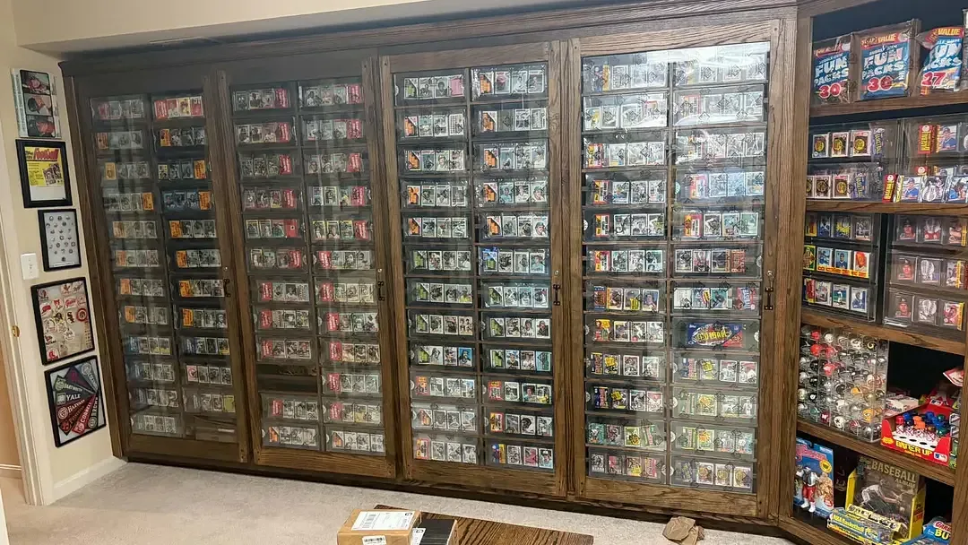 Graded sports cards displayed in a UV-filtering protective case