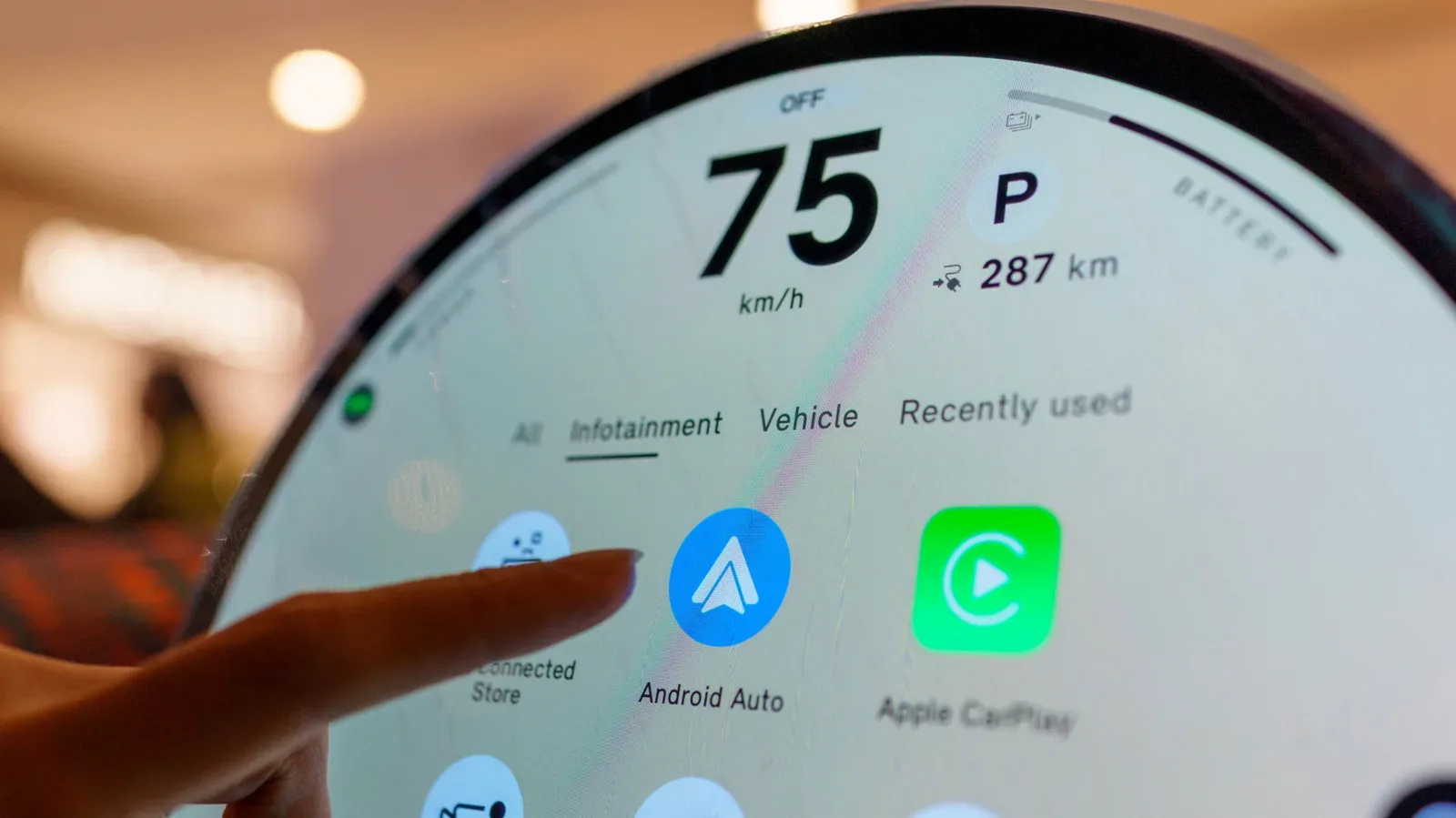 Android phone showing the Android Auto listing in the Google Play Store