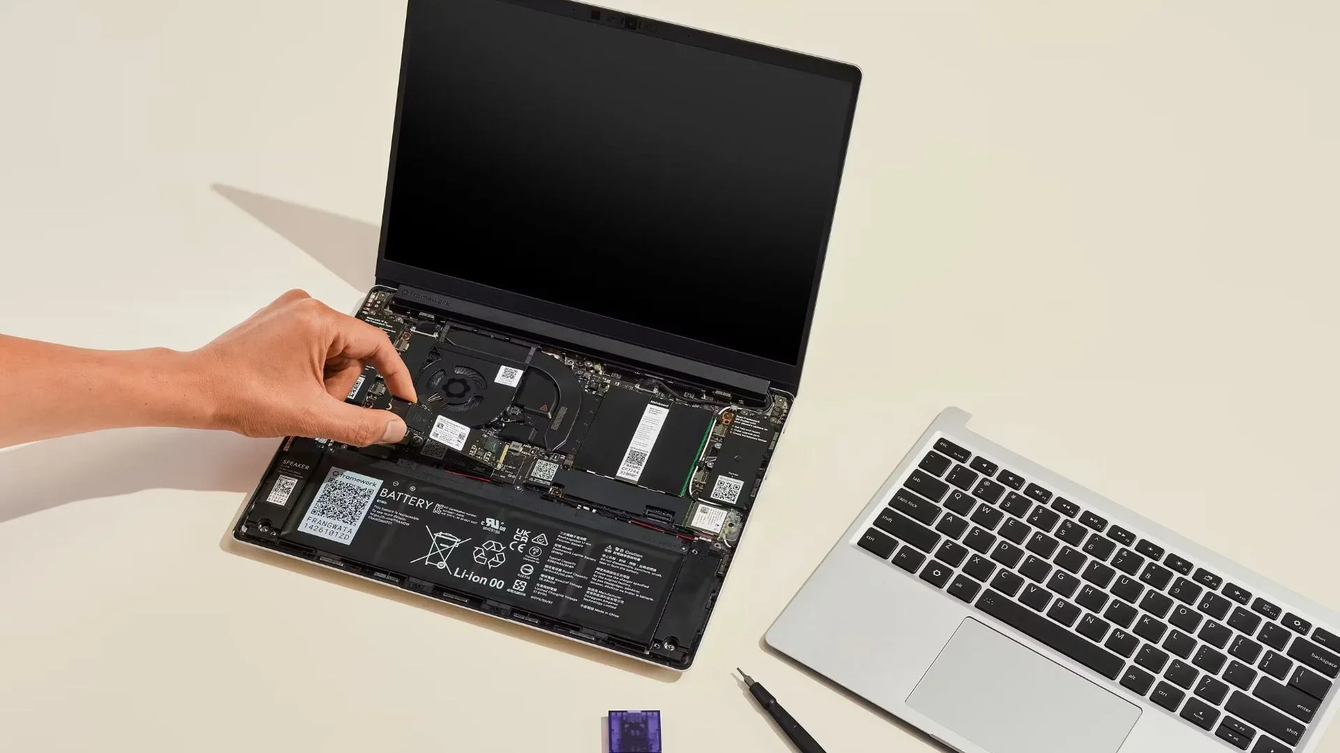 An image from Framework showing a laptop being assembled