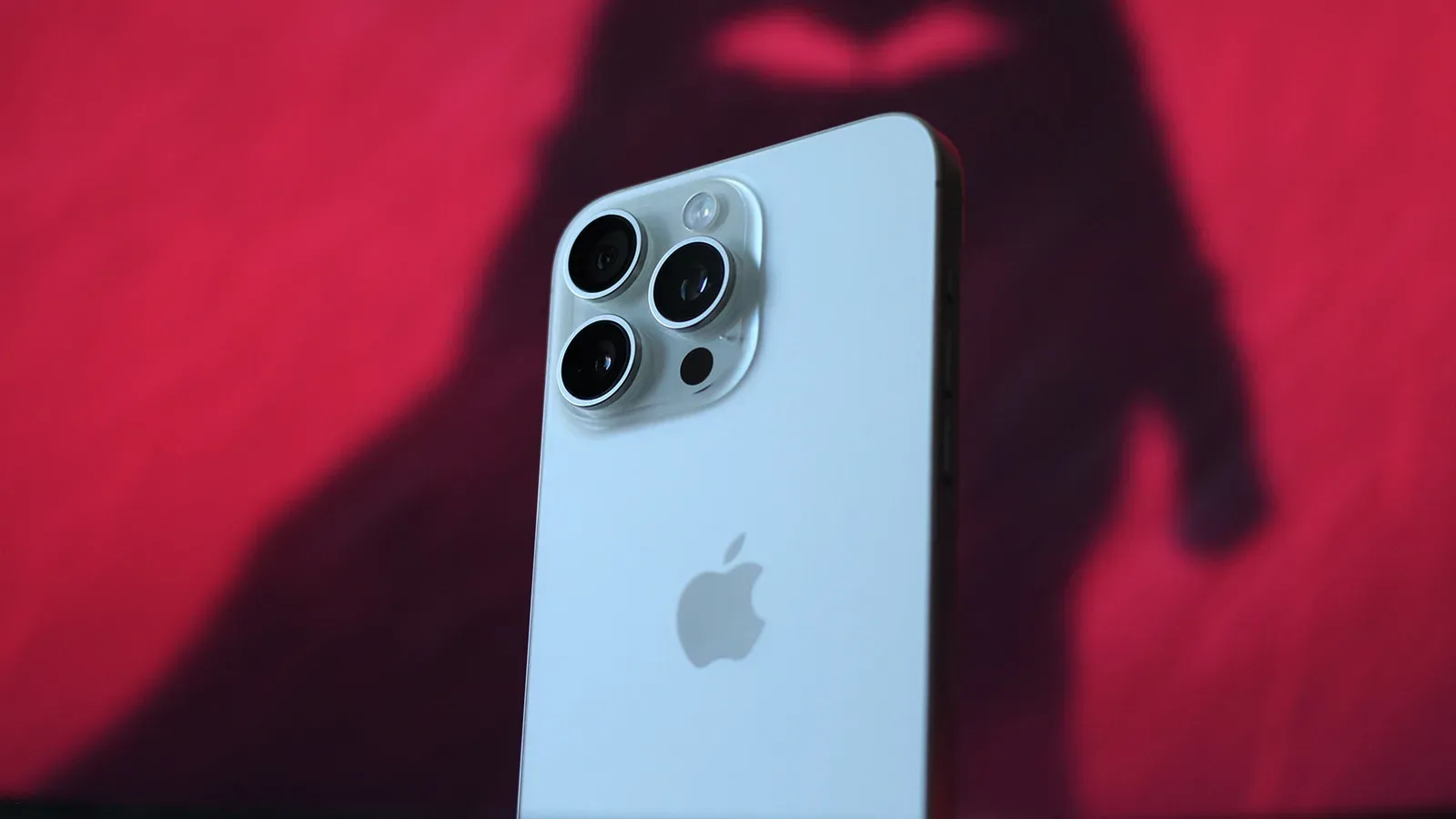 An iPhone 15 Pro Max displaying Battery Health and charge cycle information