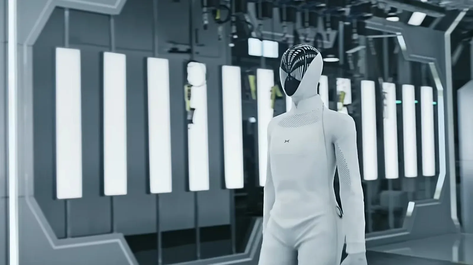 XPENG Iron humanoid robot walking away from a newly operational production line