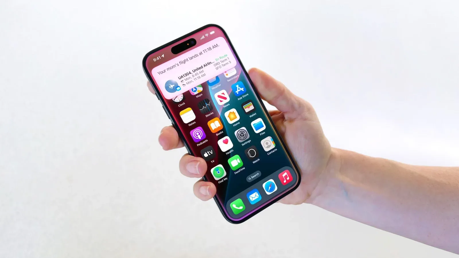 An iPhone displaying Siri beside settlement claim paperwork