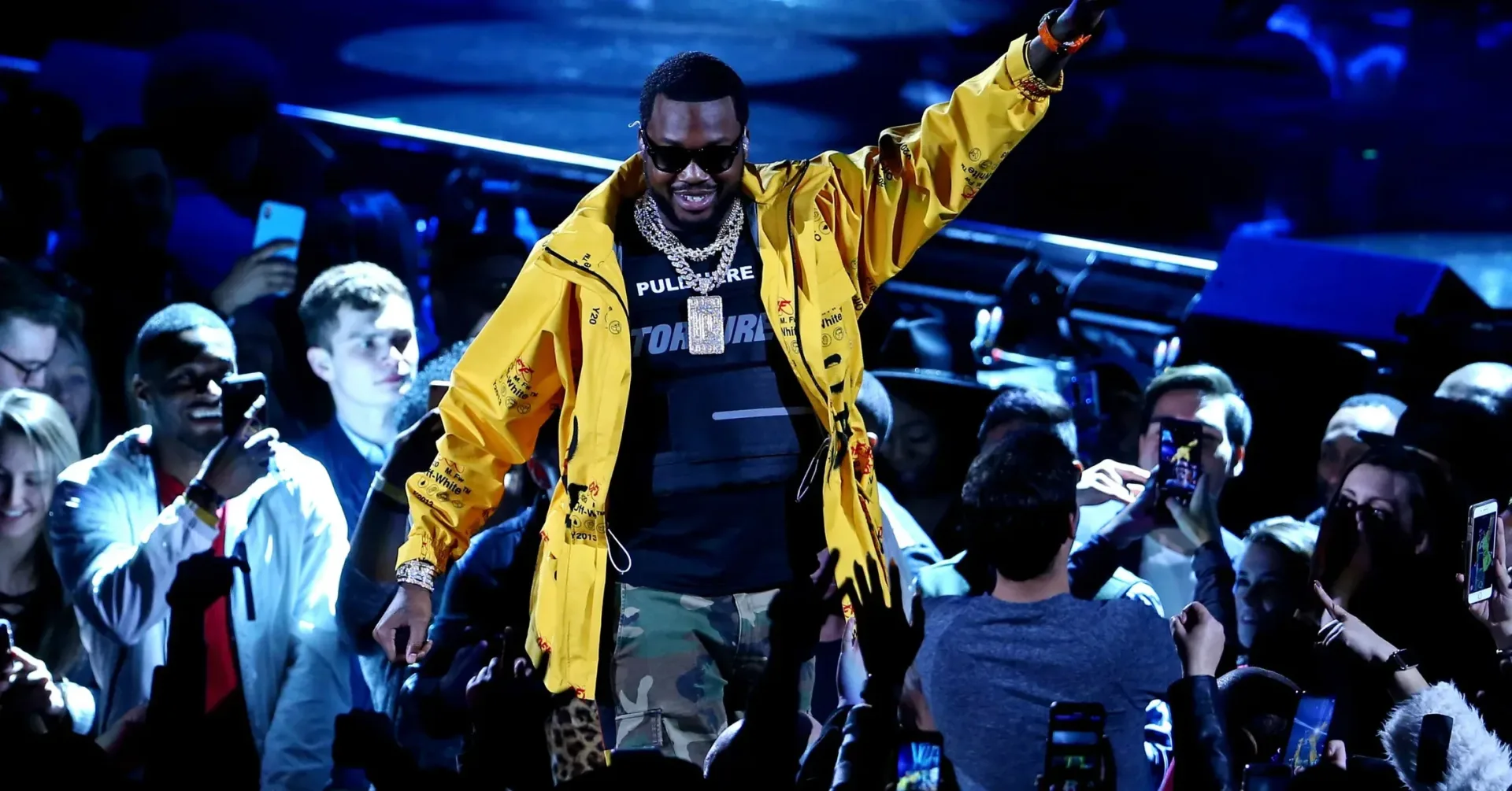 Meek Mill performing onstage