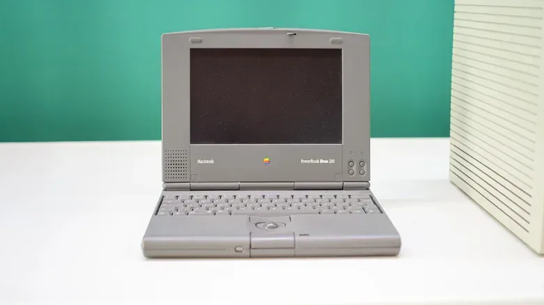 Apple PowerBook Duo connected to a Duo Dock desktop accessory