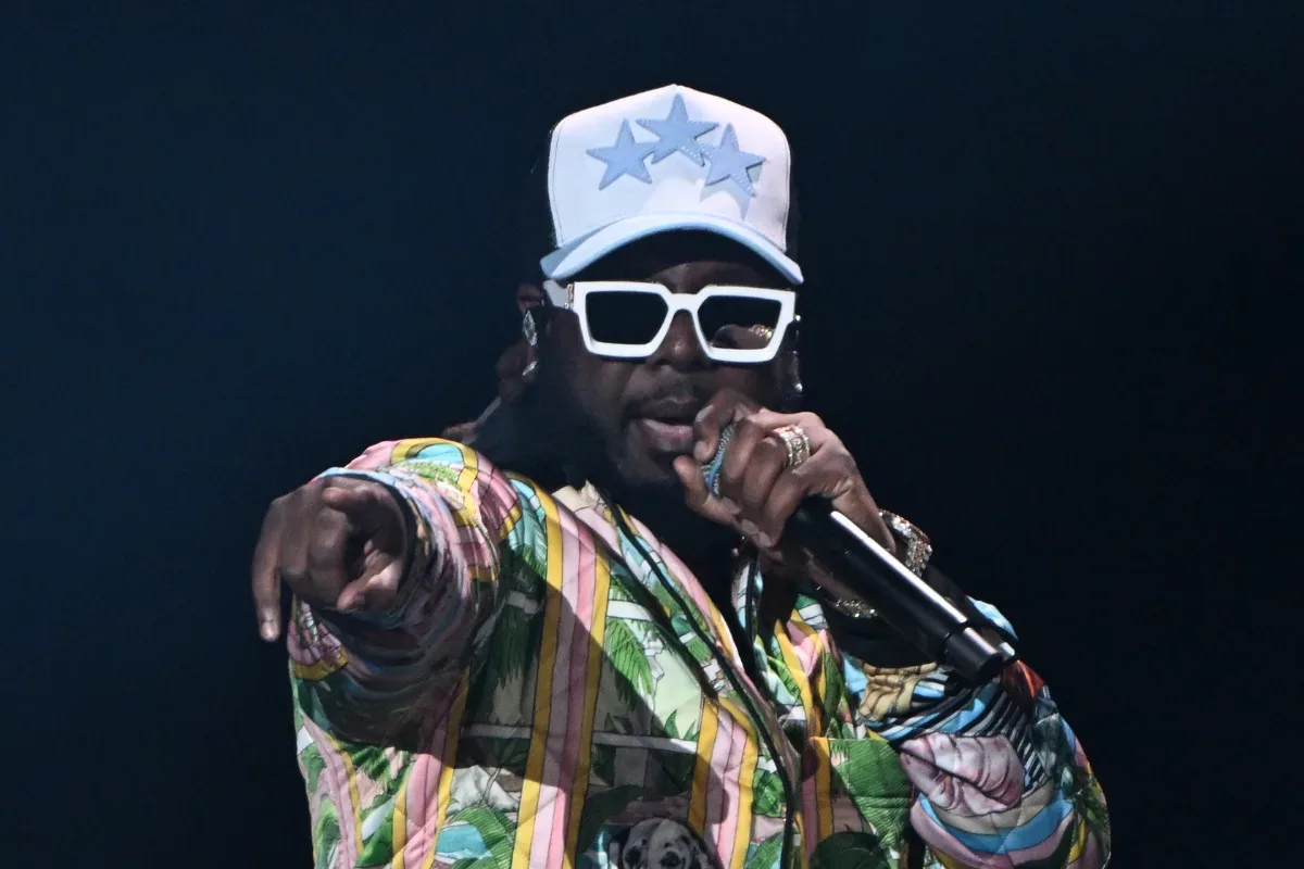 T-Pain performing onstage during a live music set