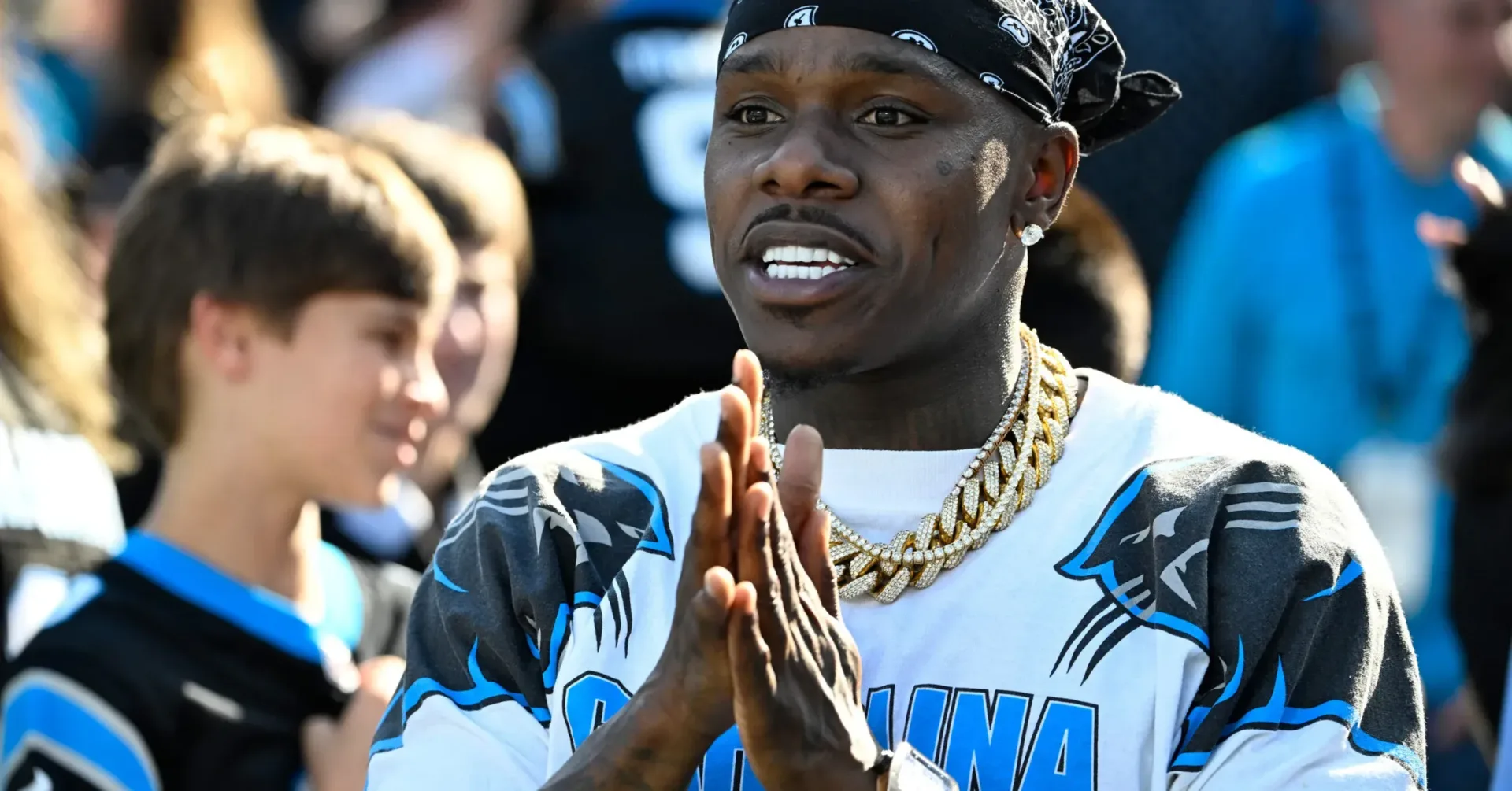 Velour posing with DaBaby at the Rookie Kids Runway on Broadway event