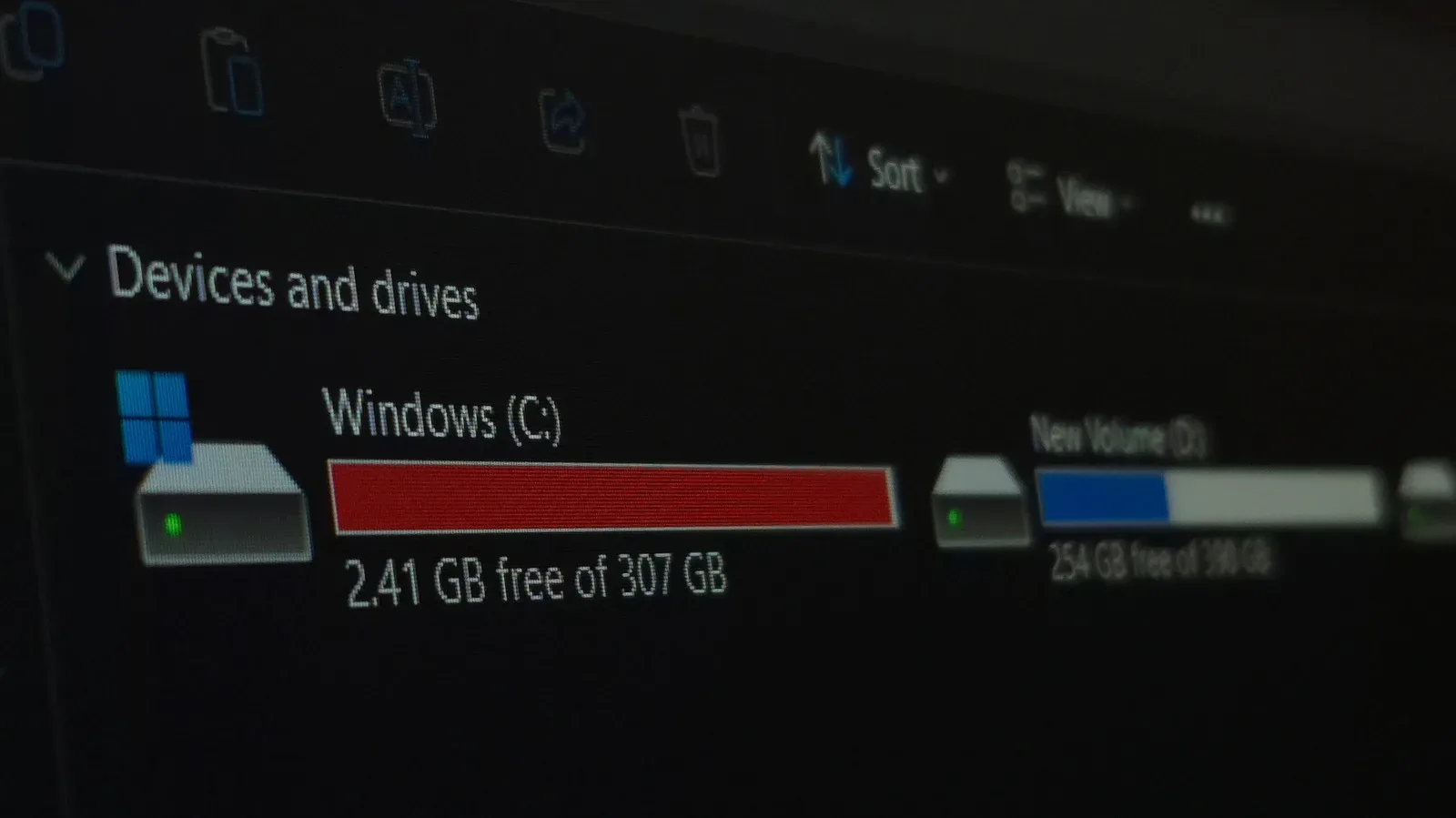 A 256GB solid-state drive beside a 1TB hard disk drive for a gaming PC storage comparison