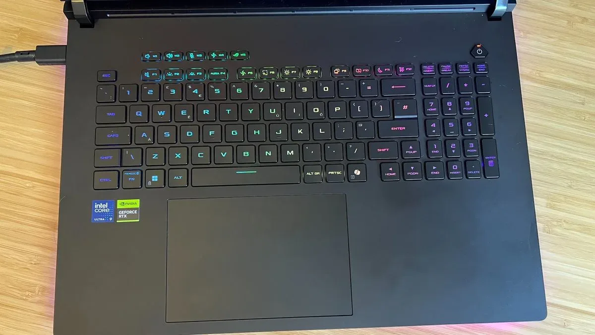 Top down view of Asus ROG Strix Scar 18 gaming laptop keyboard and trackpad