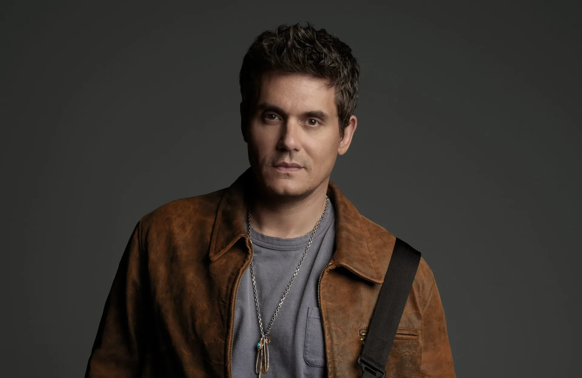 John Mayer performs onstage during a live concert