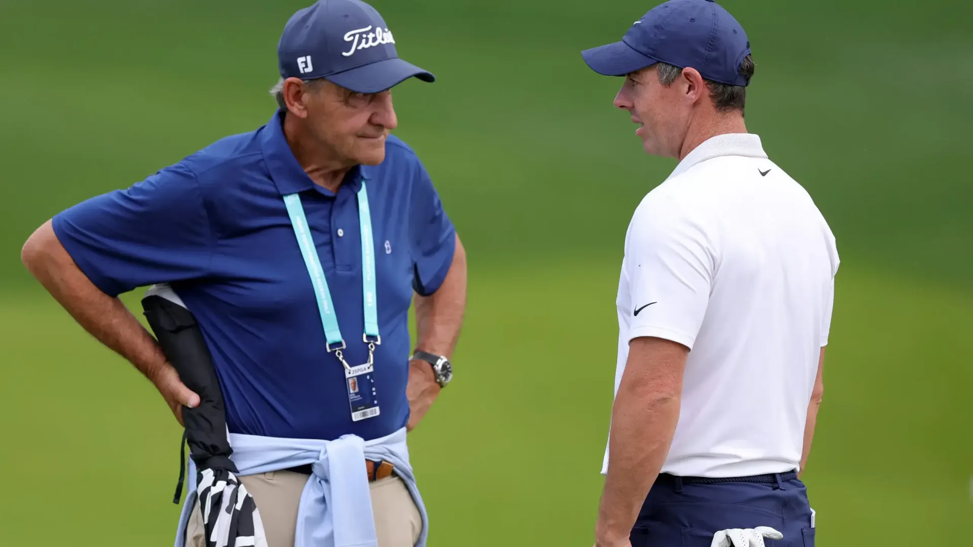 Bob Rotella speaks with Rory McIlroy before the 2025 PGA Championship at Quail Hollow