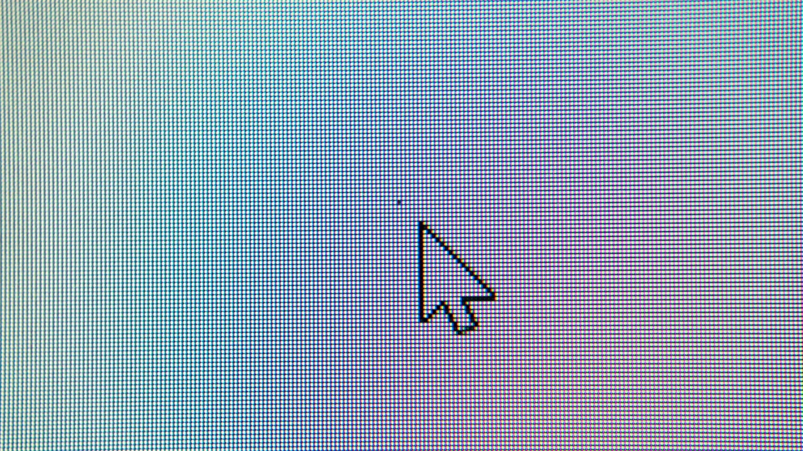 A monitor showing solid-color screens used to identify stuck and dead pixels
