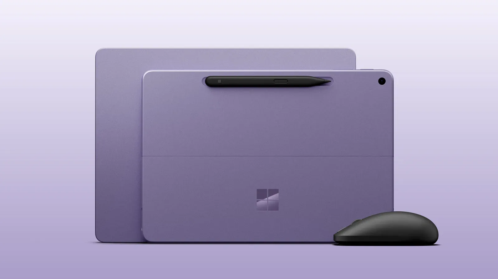 Microsoft Surface Pro 12 with kickstand beside its optional keyboard