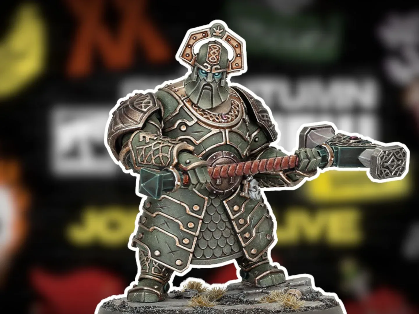 A new Gholem model for the Khazalites Holds faction, against a blurred background of spraypainted logos