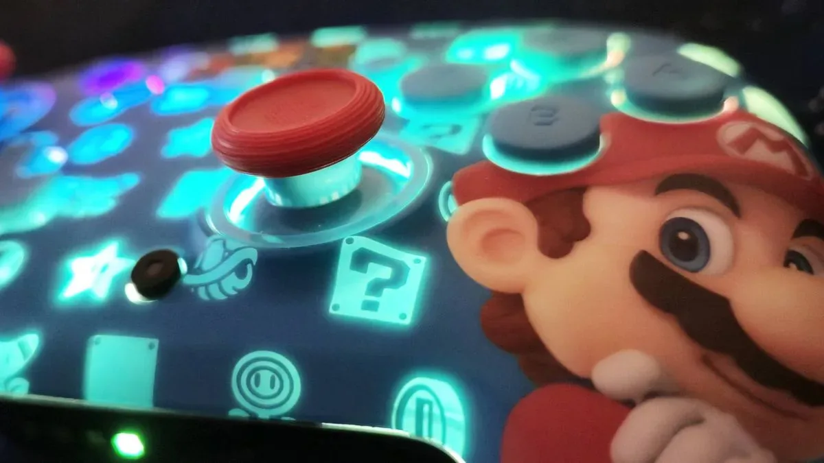 Photo of the glowing RGB lighting of the Mario and Luigi Turtle Beach Rematch Wireless Switch 2 controller.
