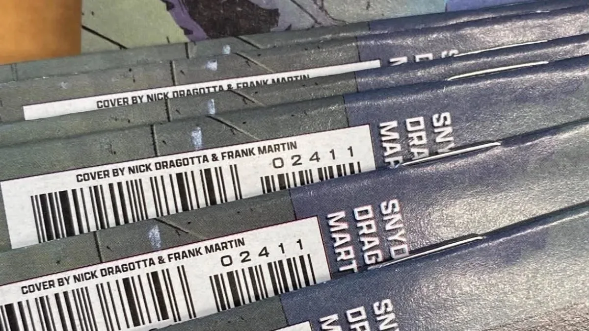 Absolute Batman #24 comic displayed for condition inspection