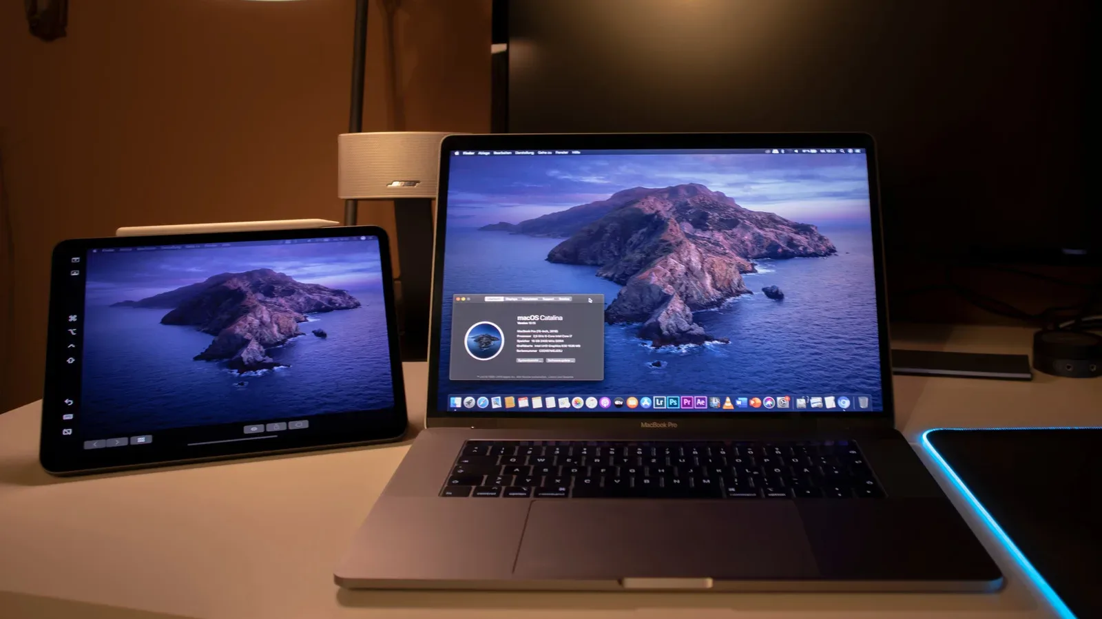 An iPad positioned beside a Mac as a secondary display