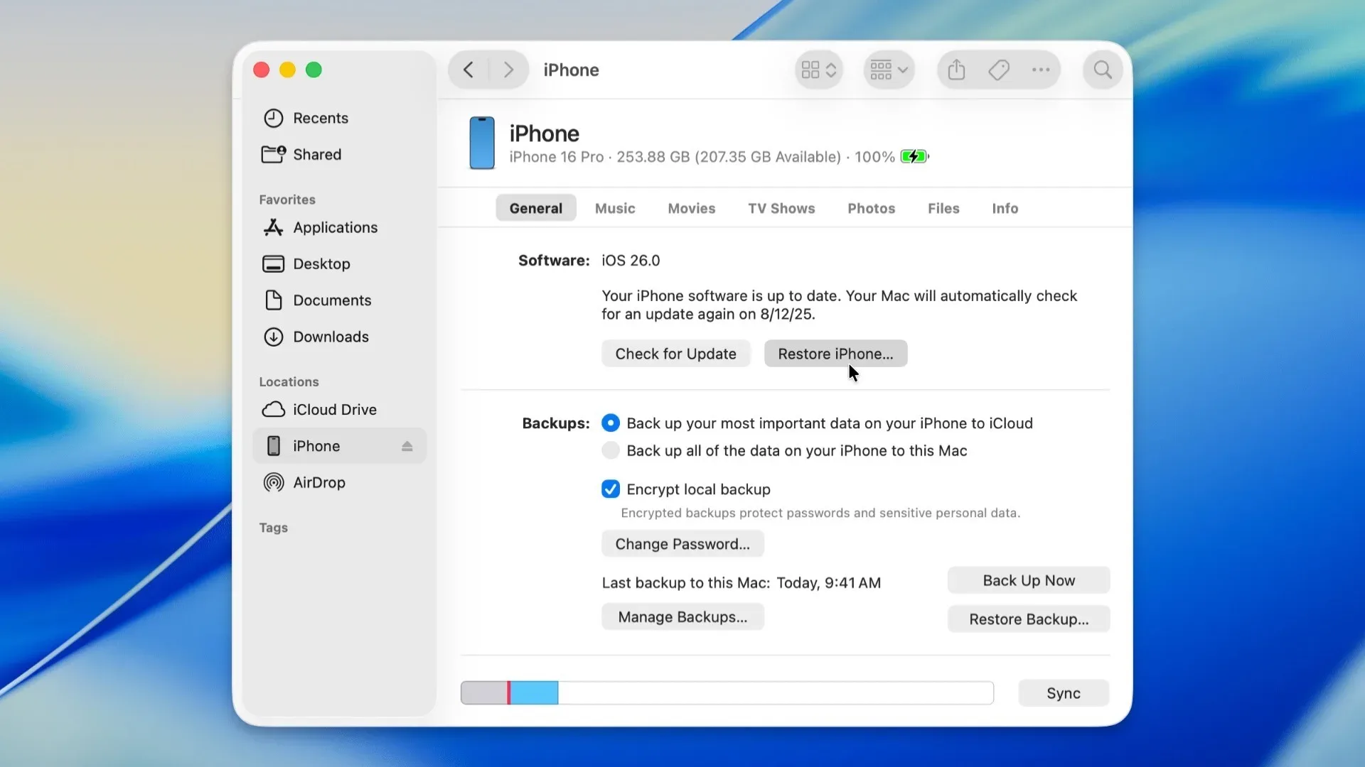 Restoring an iPhone from a Mac.
