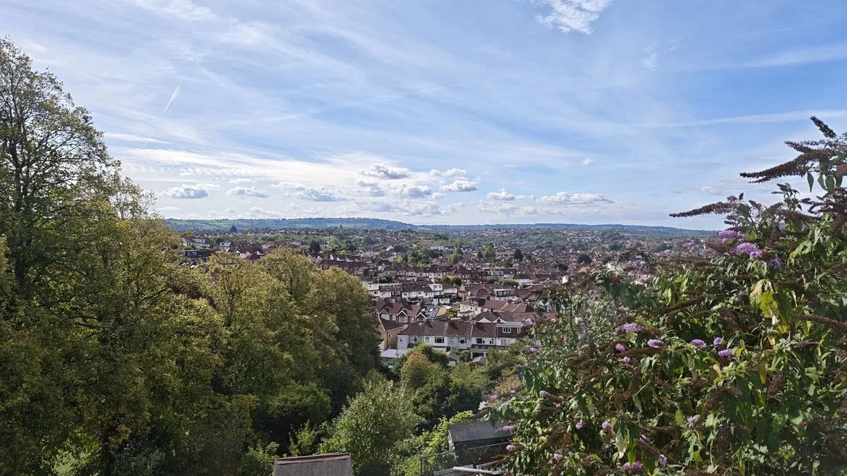 A view of hills and houses shot on a Poco F9 Ultra smartphone