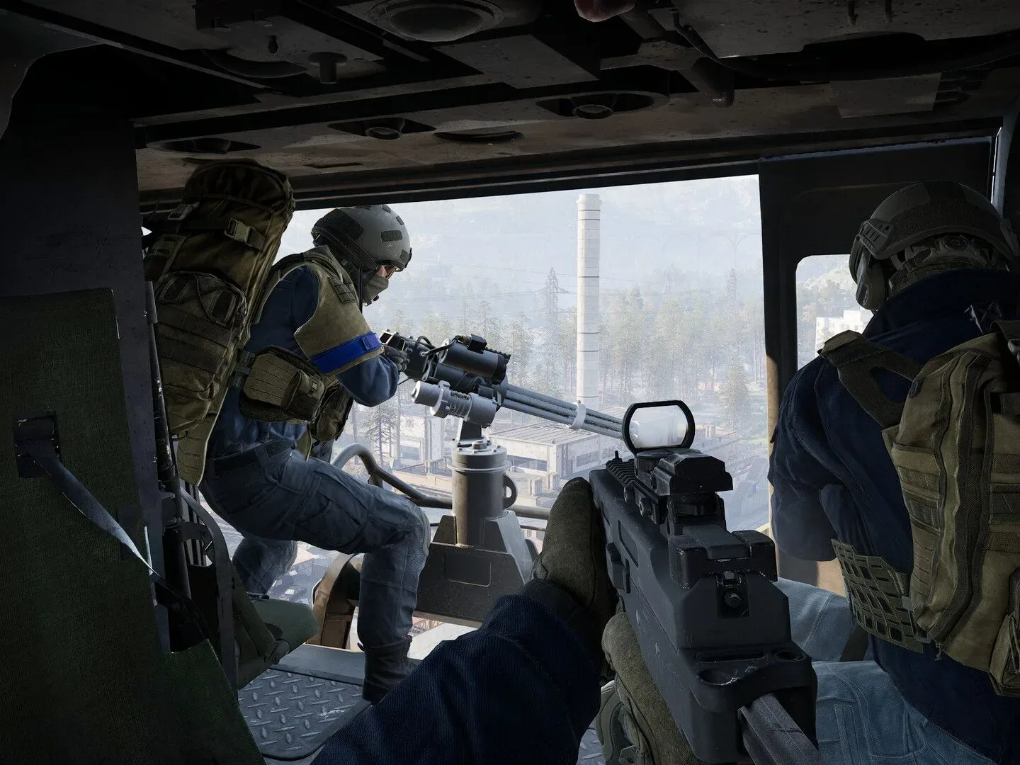 Wardogs player manning minigun looking out of a helicopter