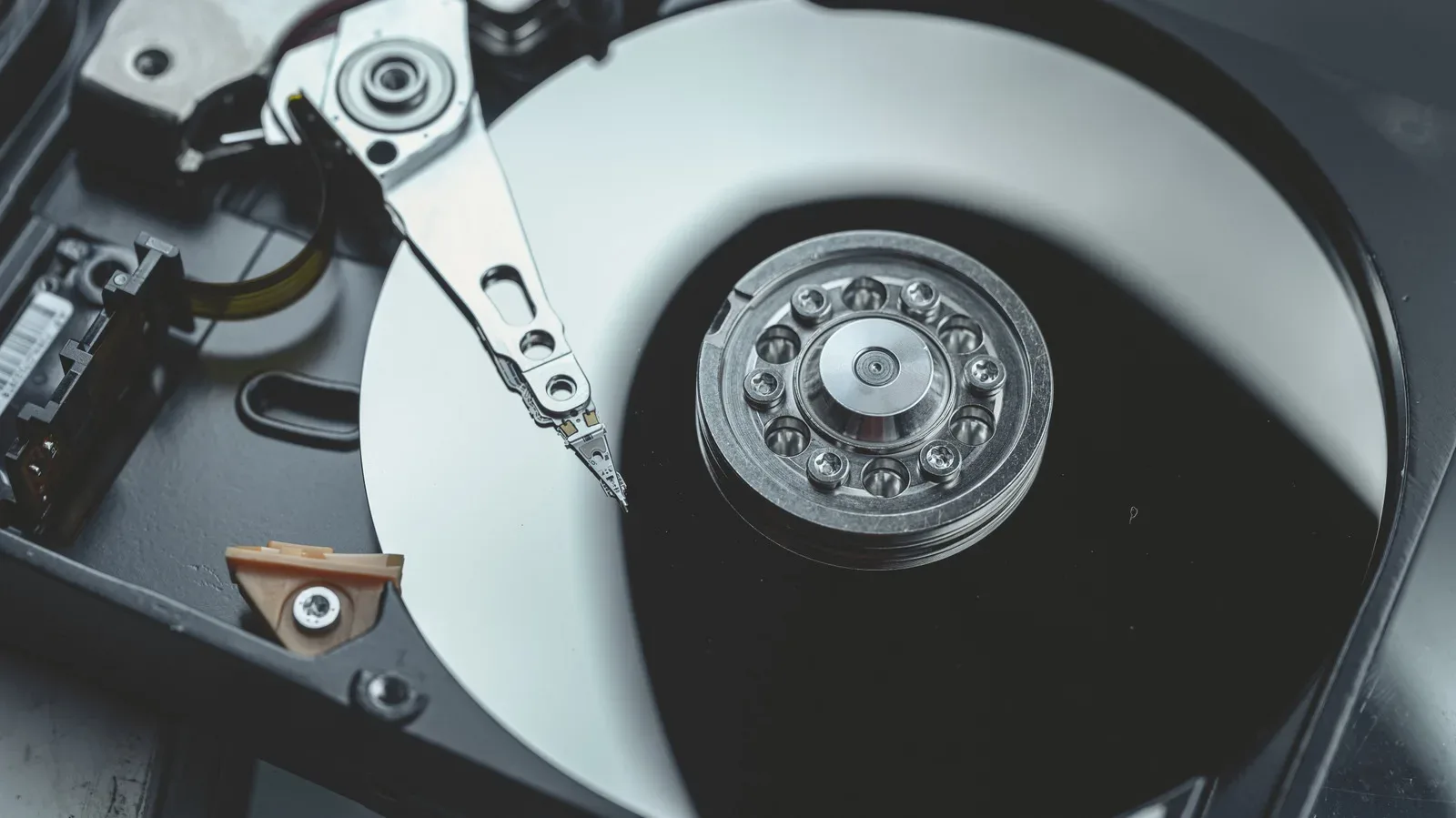 An old 3.5-inch hard drive inside a cushioned protective storage case