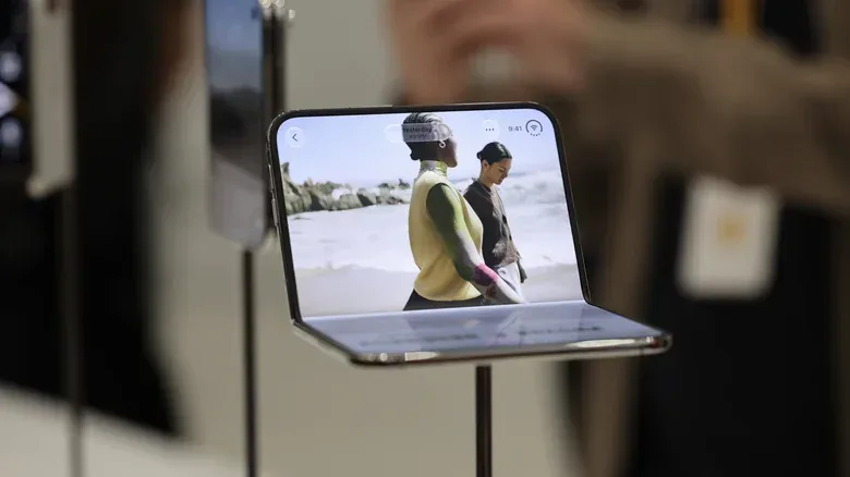 Microsoft Surface Duo dual-screen device opened on its rotating hinge