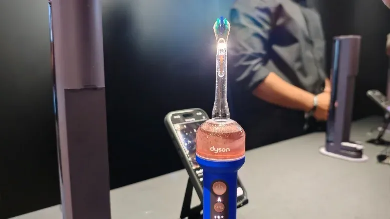 Dyson CameraJet portable oral-care device in travel mode