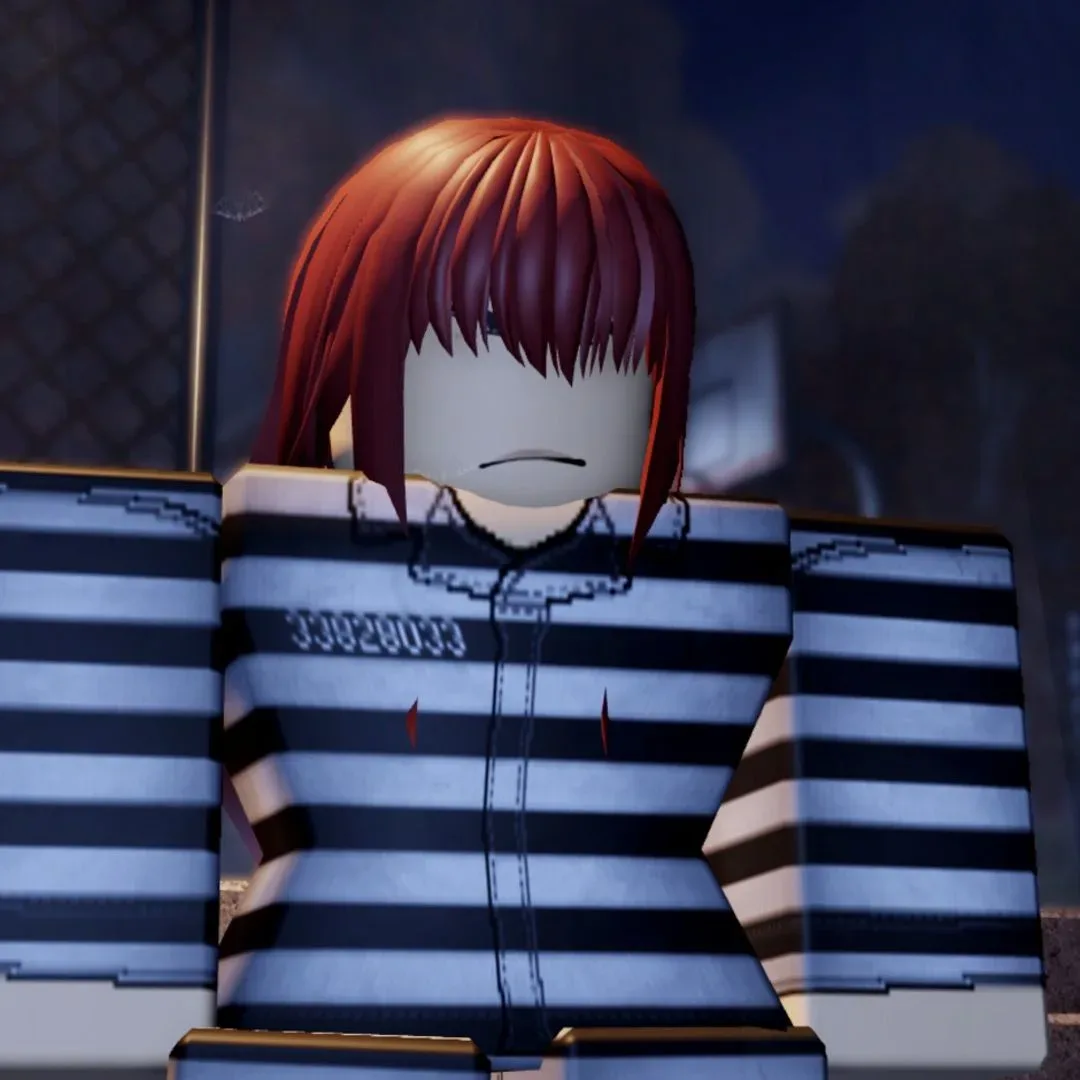 A red-haired female inmate looks unhappy in Komorebi Prison on Roblox.