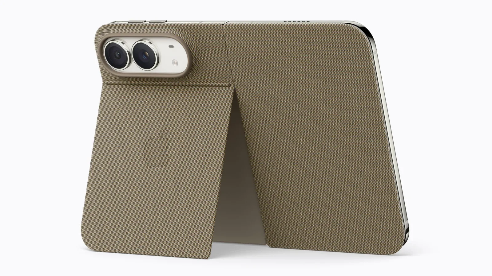iPhone Duo shown folded beside a magnetic wireless charger