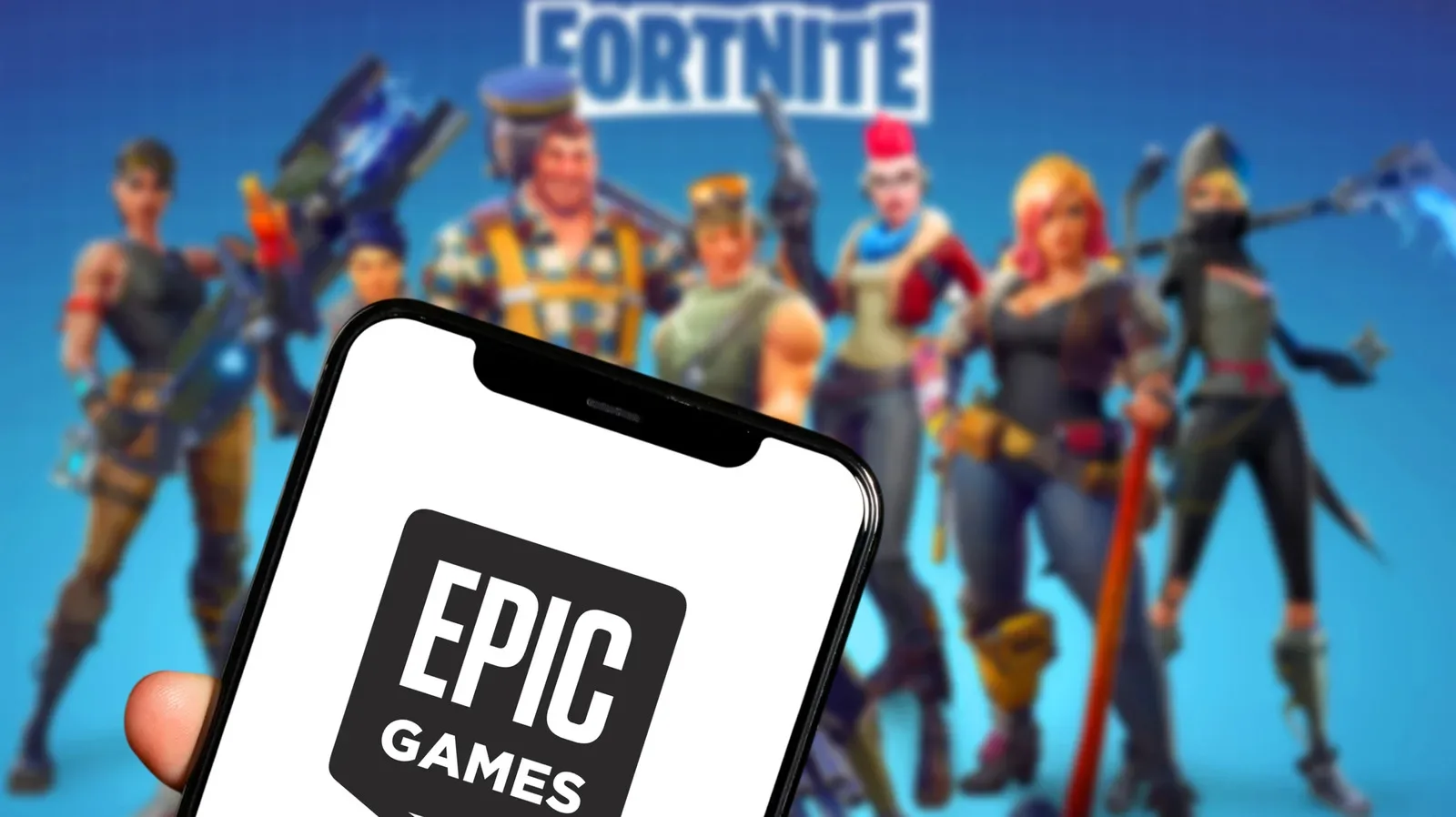 Fortnite displayed on an iPhone beside Apple App Store and alternative payment icons