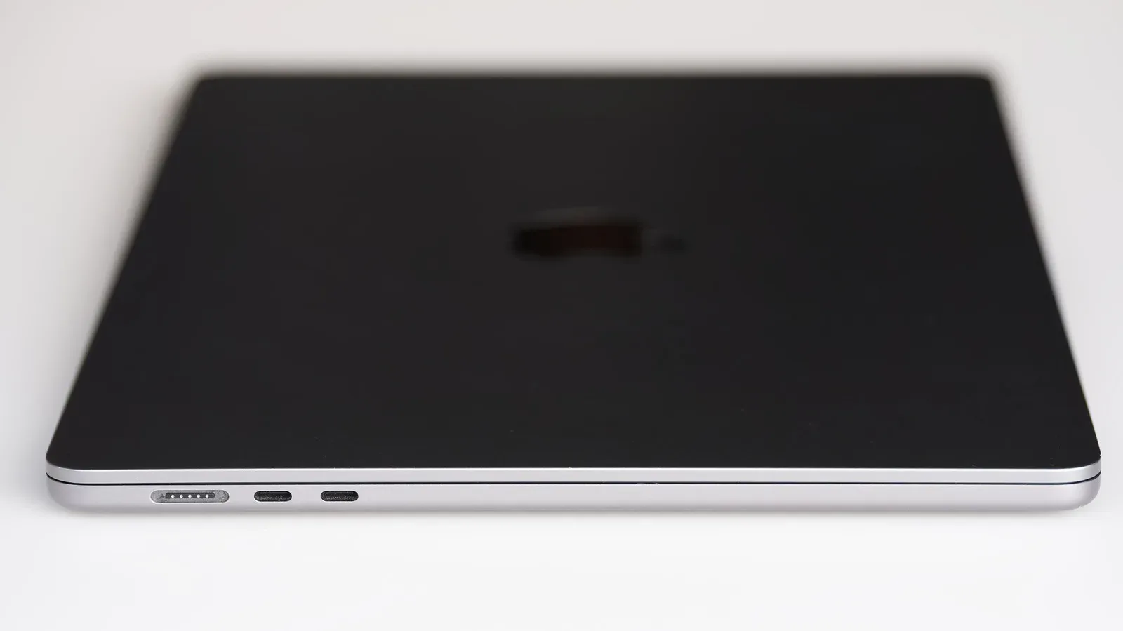 A USB-C cable connected to a modern MacBook port