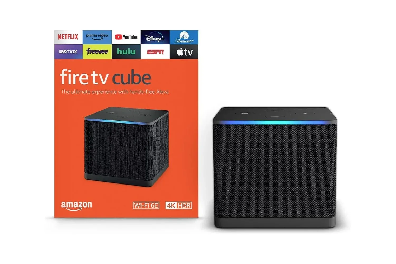 Amazon Fire TV Cube streaming device beside a television and game console