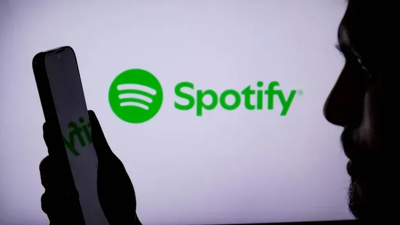 Spotify Premium Family plan account verification notification on a phone
