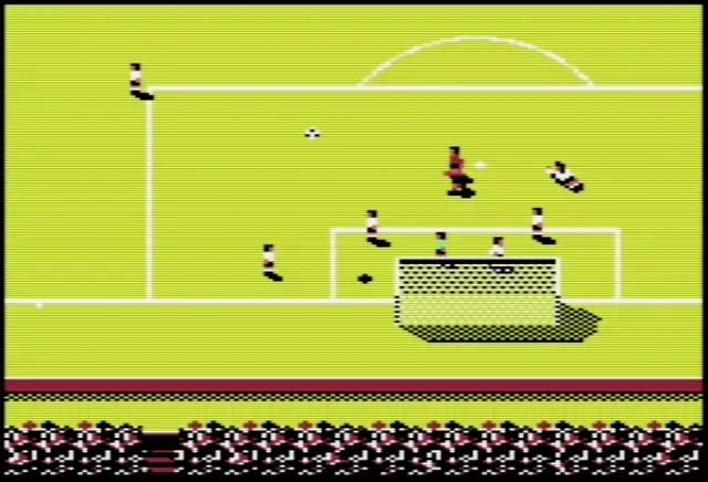 Arlasoft Soccer gameplay showing players and ball on a scrolling C64 pitch