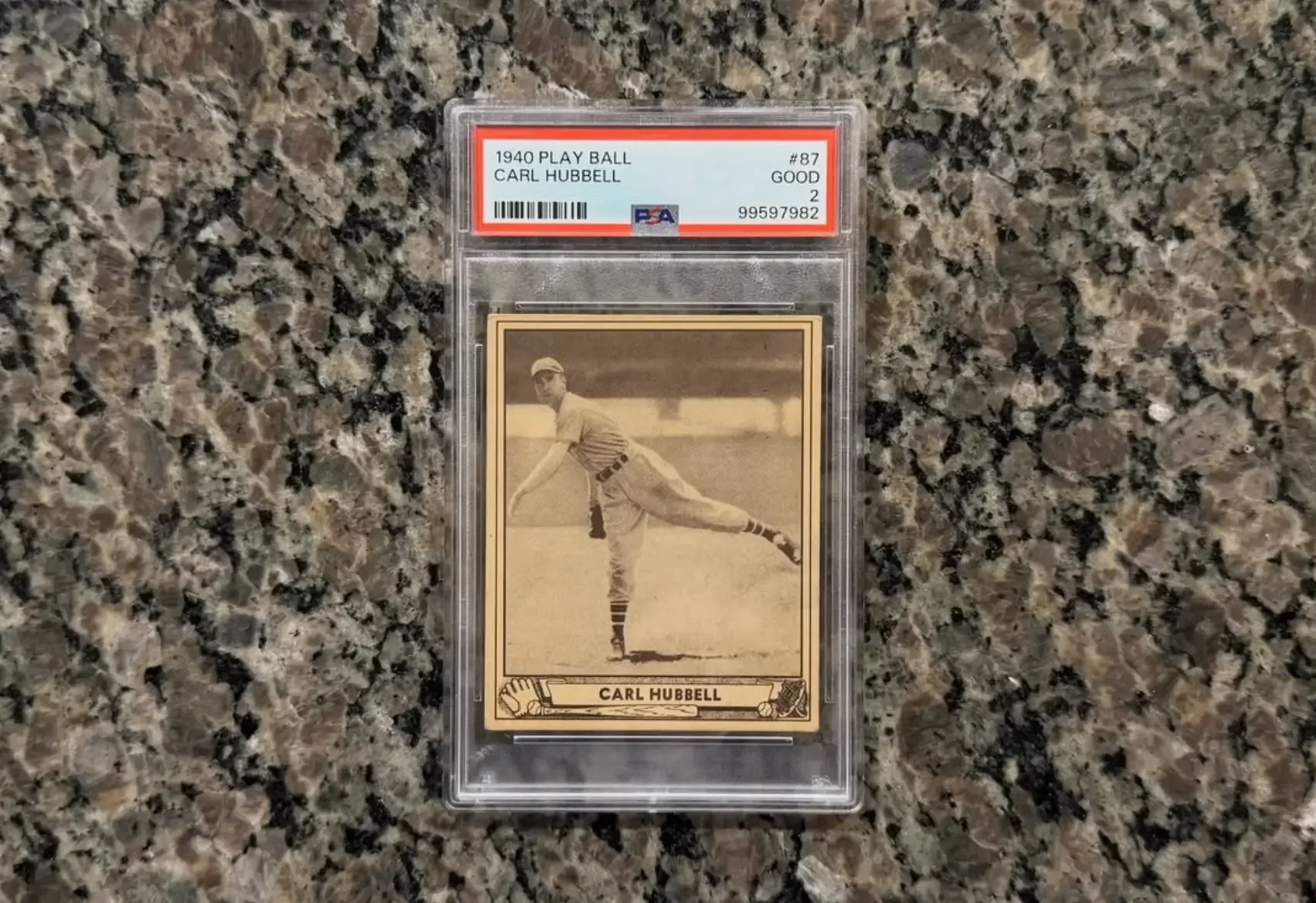 1933 Goudey #234 Carl Hubbell baseball card with a red background and hatless portrait