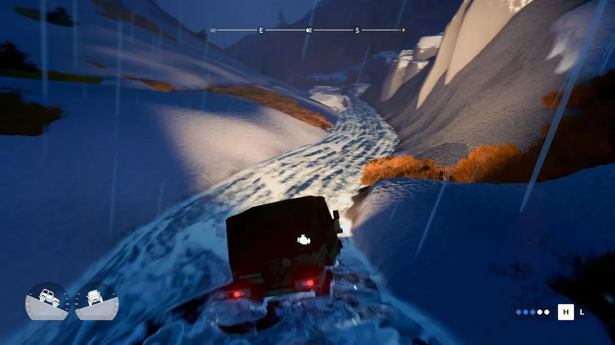 An off-road vehicle navigating rugged wilderness terrain in Over the Hill