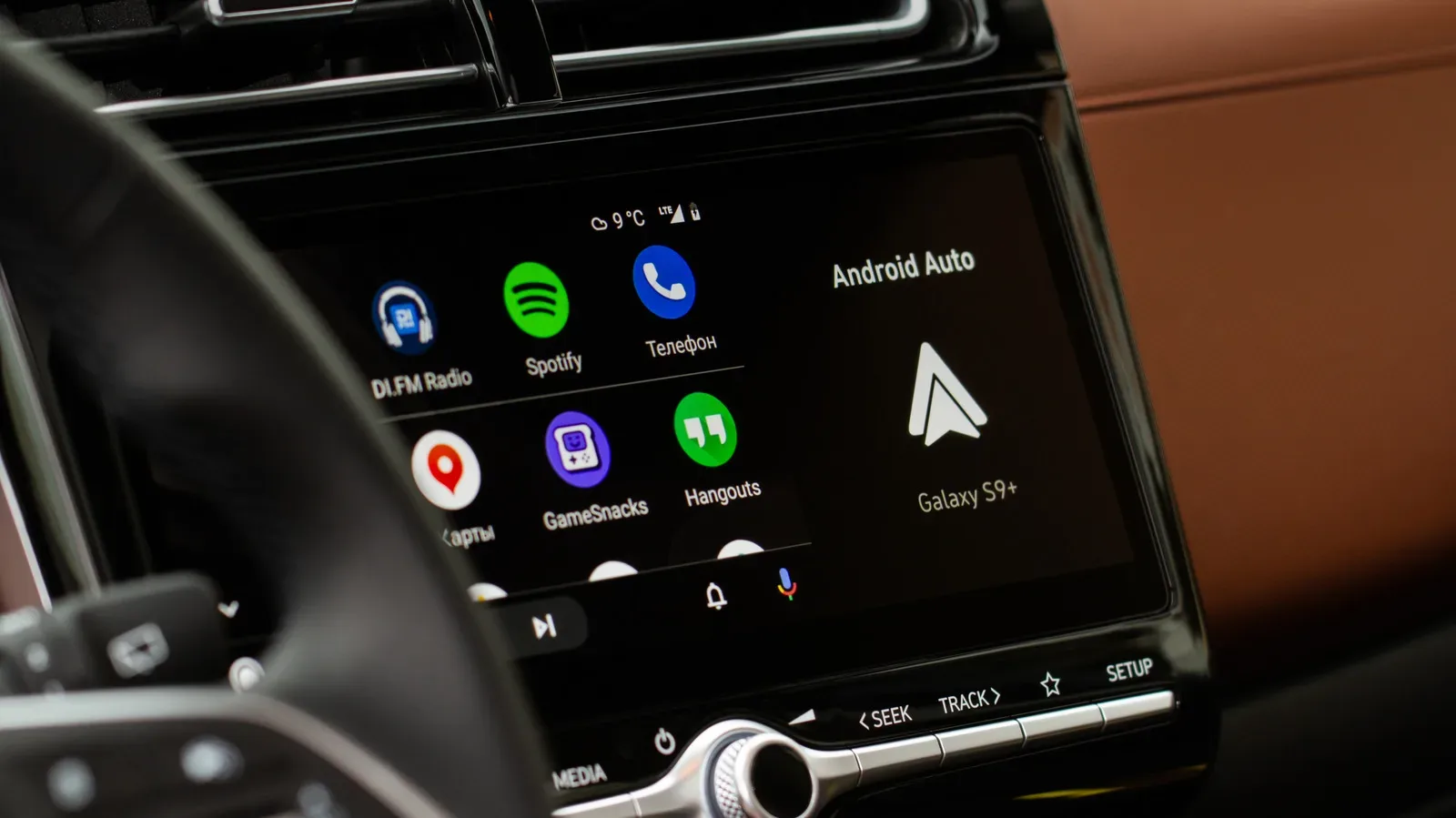 Android phone Android Auto settings showing the Start music automatically option