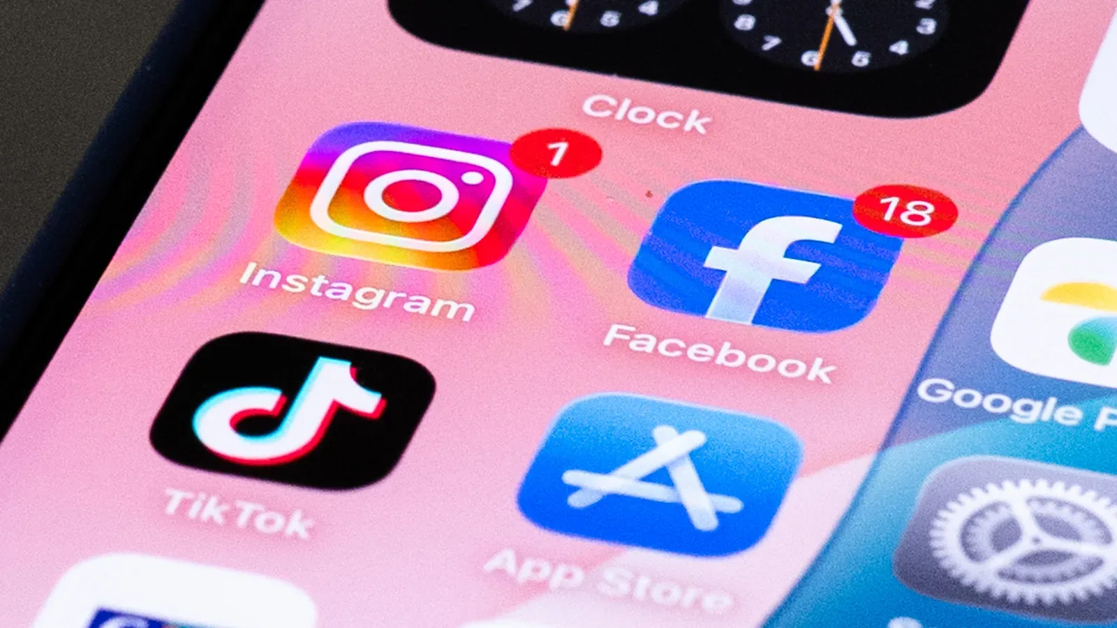Meta and TikTok app icons representing a dispute over social-media advertising