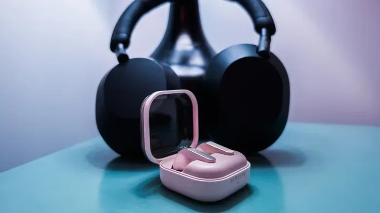 Samsung Galaxy Buds 4 Pro true wireless earbuds posed alongside Sony WH-1000XM5 wireless headphones.
