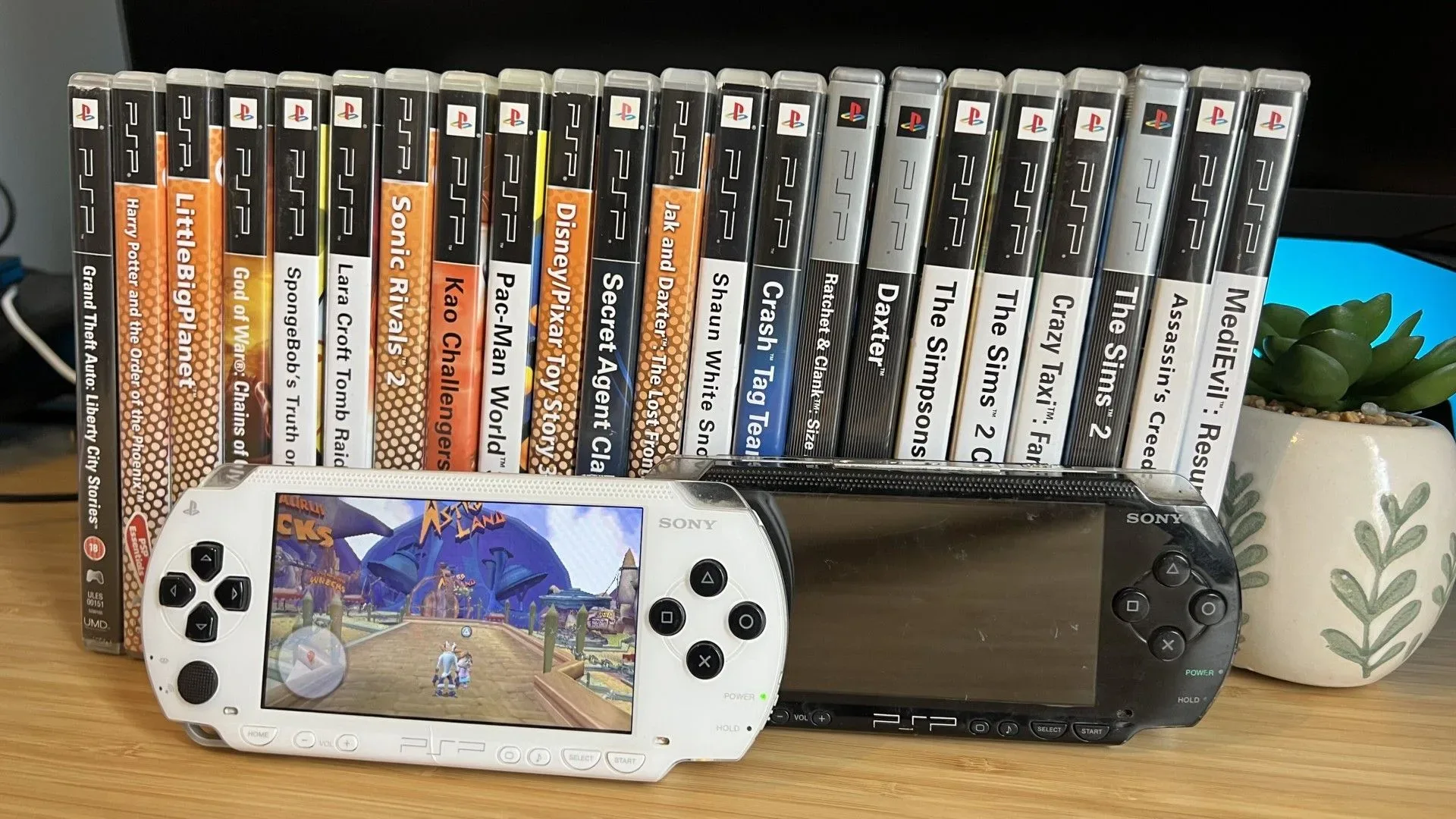 A PlayStation Portable shown beside a Nintendo DS, representing the handheld rivalry discussed by Shawn Layden
